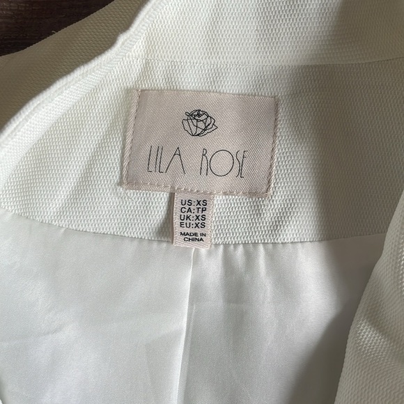 Lila Rose White Sleeveless Wrap Mini Dress - Picture 10 of 13